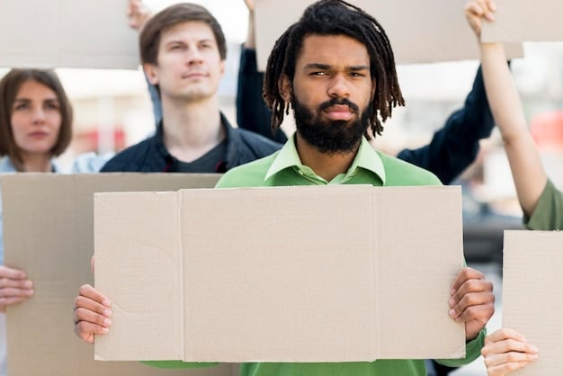 A group of diverse protestors holding signs advocating for social justice and accountability, with a blurred background representing the broader societal call for change.