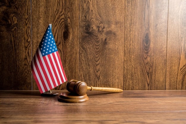 A gavel resting on a stack of law books, with the American flag subtly displayed in the background. The image conveys the legal and judicial aspects of fighting workplace discrimination.