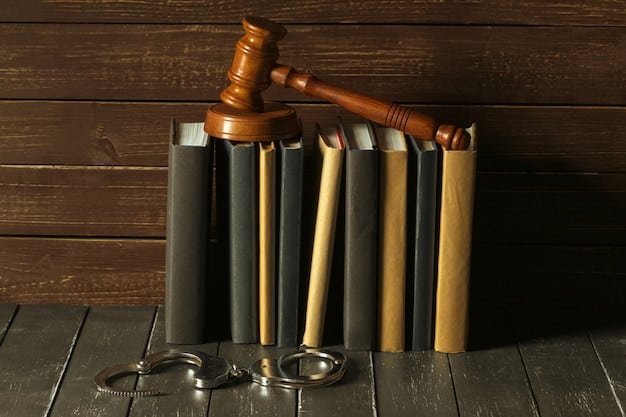 A gavel resting on a stack of legal books in a dimly lit library, symbolizing justice and legal rights.