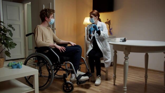 A doctor communicating with a patient who uses a wheelchair in an accessible examination room. The room is spacious with adjustable equipment, highlighting a barrier-free environment.