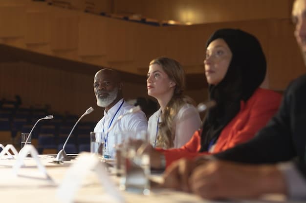 A diverse panel of community leaders, academics, and activists discussing policy changes aimed at addressing racial bias in law enforcement. The setting is a public forum, with attendees listening attentively and engaging in thoughtful conversation.