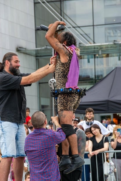 A crowd of people at an outdoor music festival, with diverse ages and backgrounds. The image should celebrate the diversity of live music audiences.