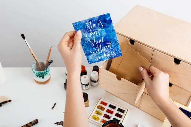A close-up shot of an artist's hands carefully packaging a painting for shipping, with a thank-you note visible. The workspace is clean and organized, conveying professionalism.
