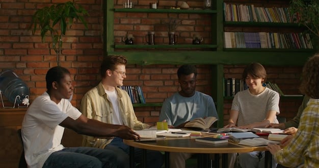 A diverse group of students studying together in a university library, representing the desired outcome of diversity policies in education. The mood is collaborative and focused.